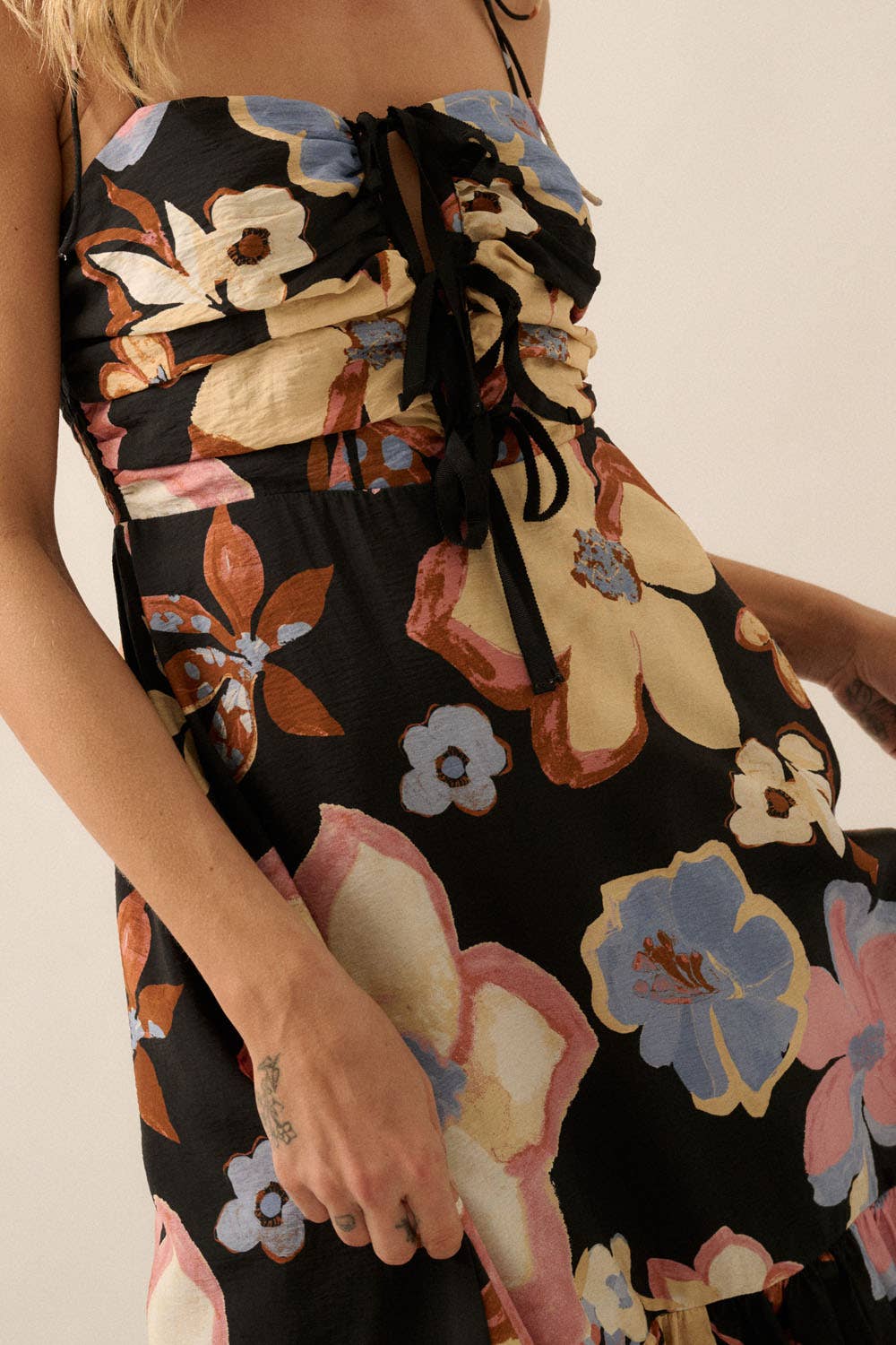 Black Textured Floral Tie-Front Midi Dress close up view of tied bodice and floral pattern