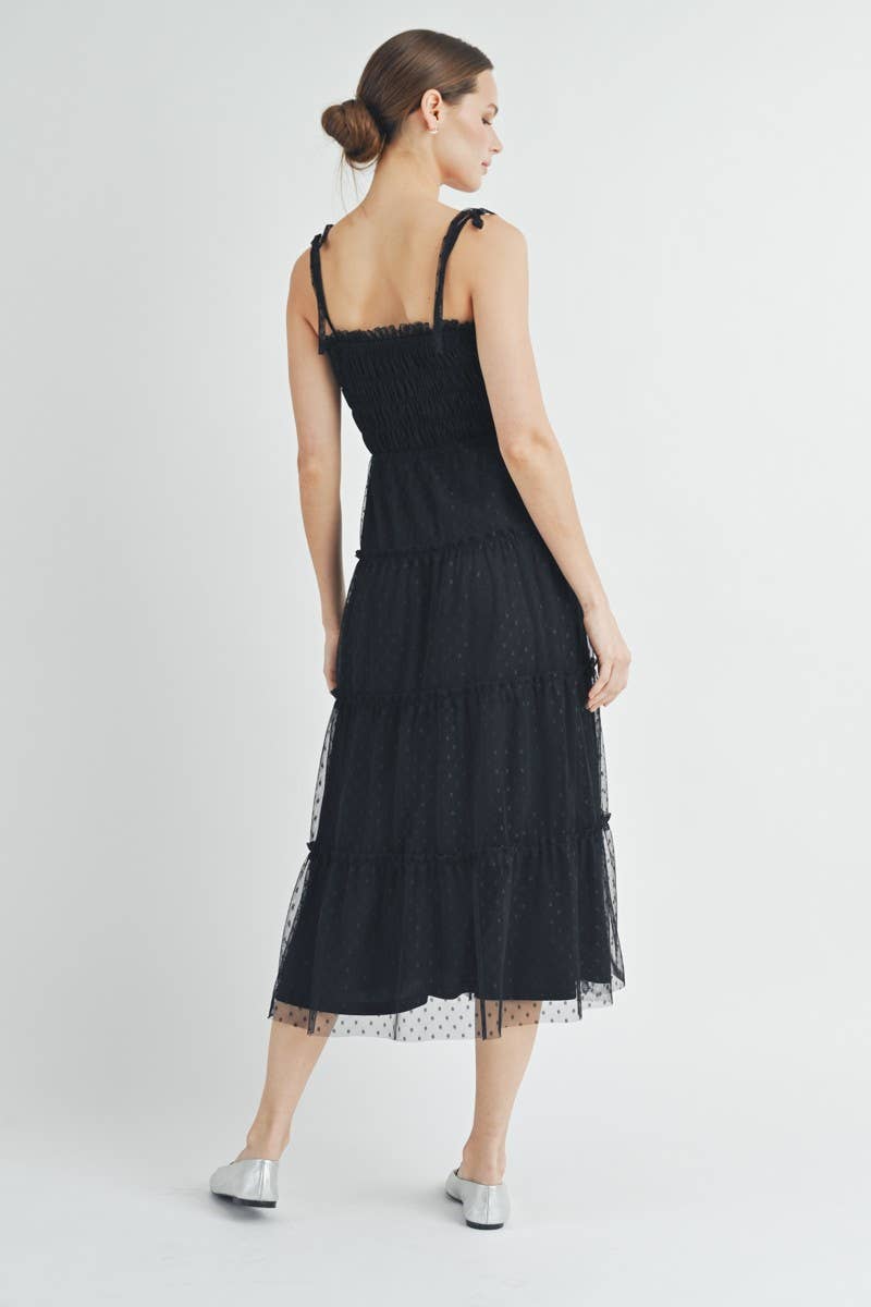 Back view of Clovette Midi Dress with smocked panel and low back detail