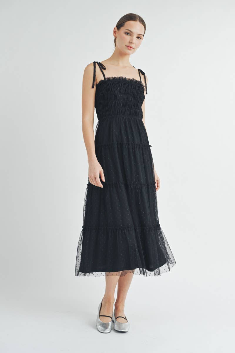 Detail shot of ruffled tiered hemline and dotted mesh overlay Clovette Midi