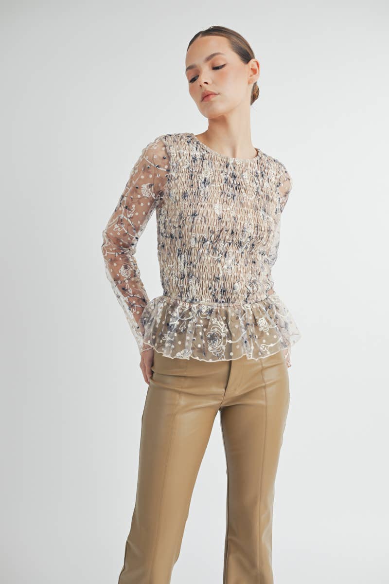 Elowen Peplum Top Detail shot of long sheer sleeve with delicate embroidery