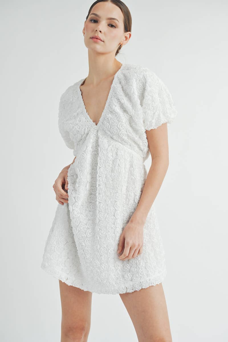 Model wearing Floriane Mini Dress styled for a summer garden party