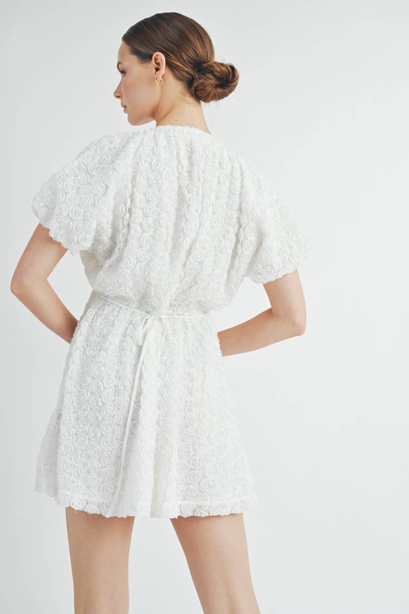 Back view of Floriane Mini Dress with puff sleeves and lined finish