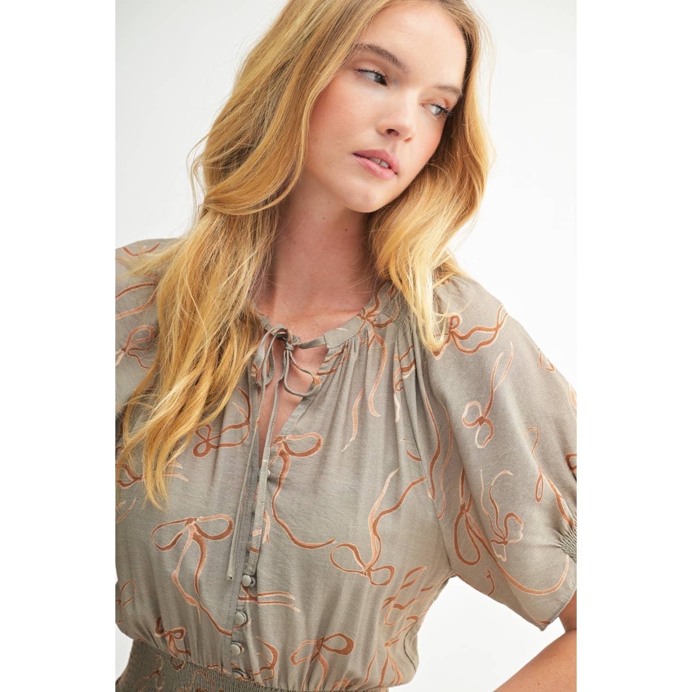 Sage Bow Print Button Front Midi Dress showcasing bodice