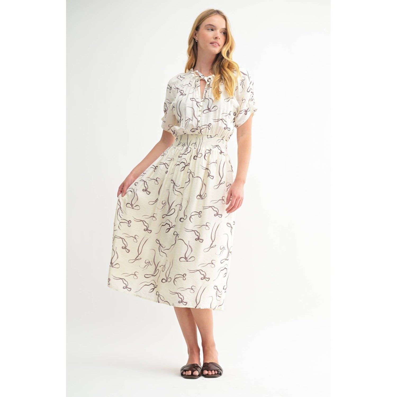 Second front view highlighting the flattering midi length and lightweight, flowing fabric.
