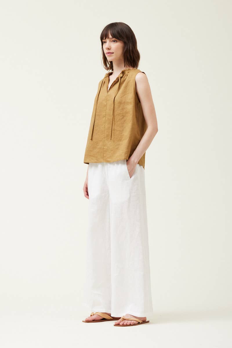 The Brown Olive Sleeveless Linen Top featuring tie neck closure