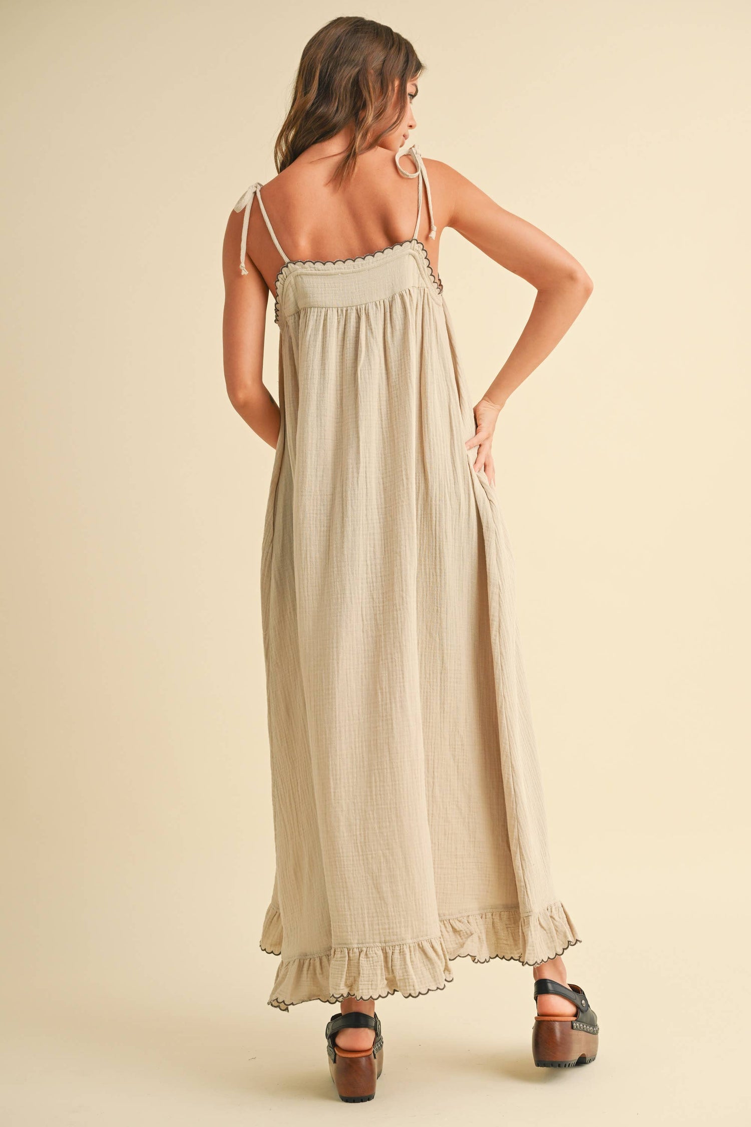 Back view showcasing the embroidered detail and breezy, relaxed fit.

