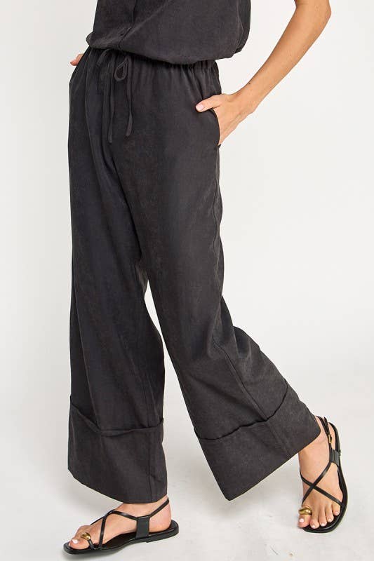 Black Mid Rise Pants showcasing large cuff detail and pockets