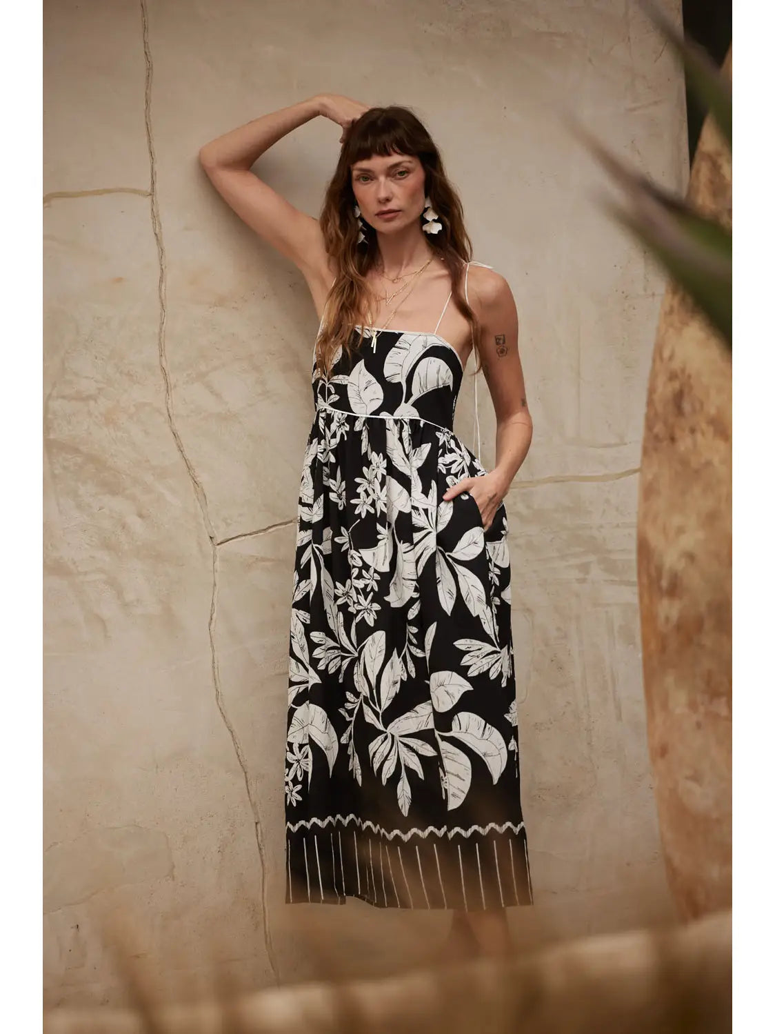 Black Tropical Maxi Dress featuring fitted bodice and flared skirt