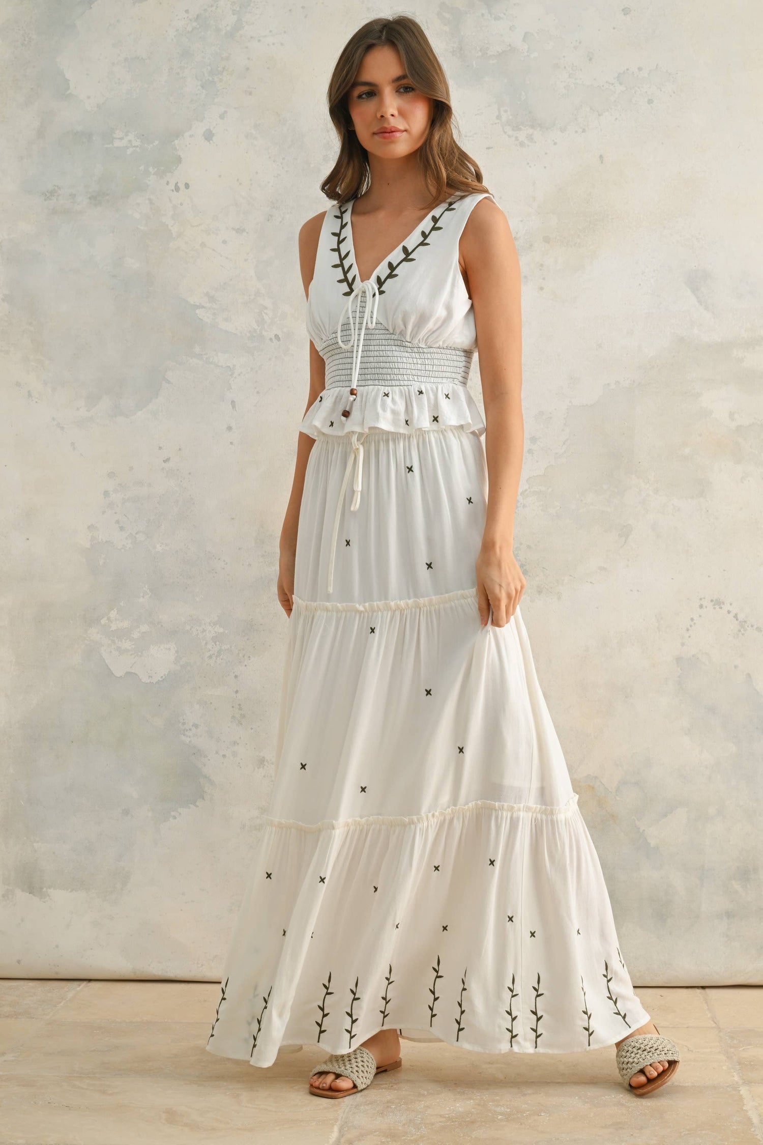 Cream Embroidery Smocking Waist V-Neck Top showcasing v neckline and embroidery