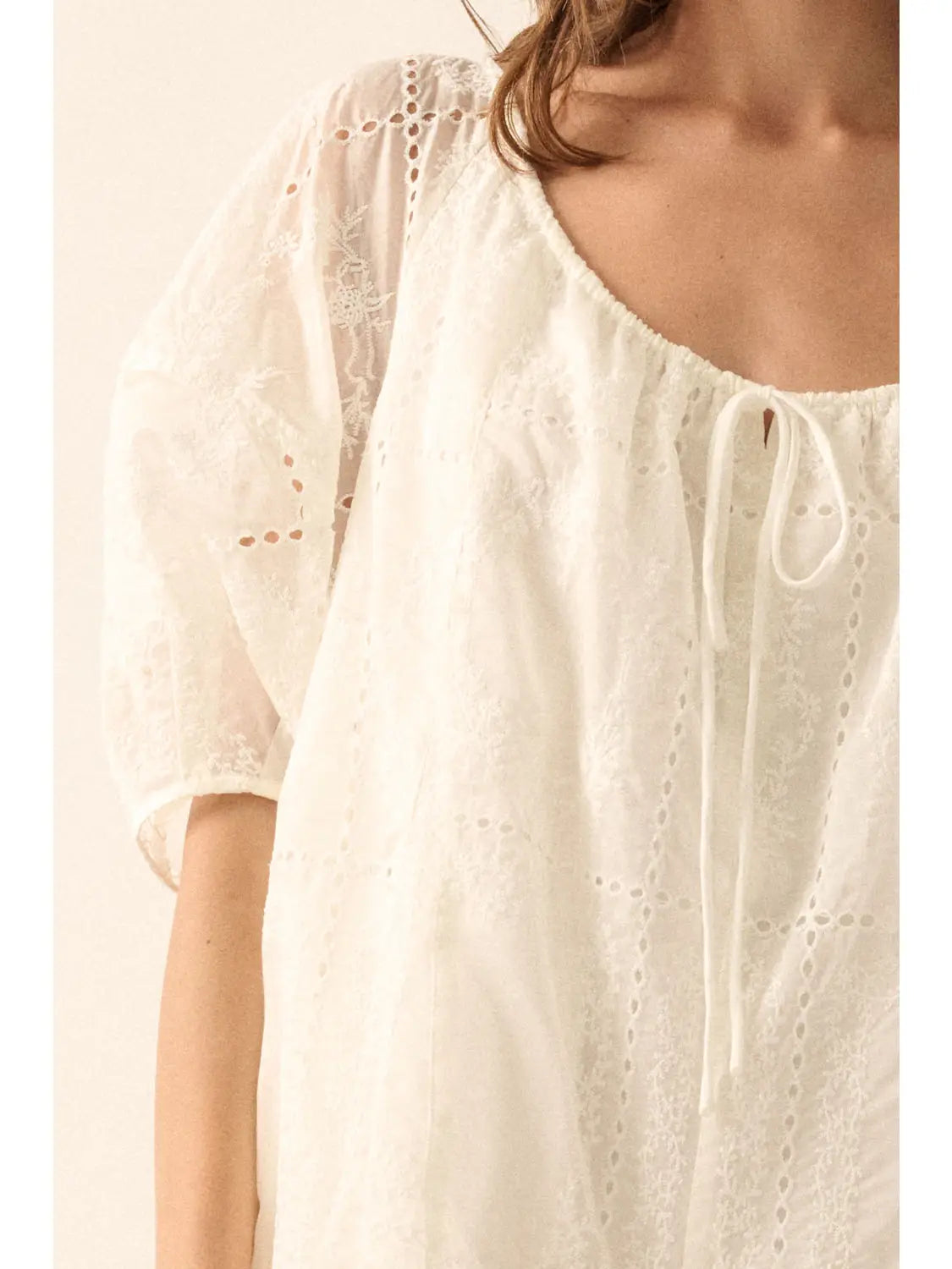 Cream So Pure Eyelet Lace Puff-Sleeve Romper showcasing embroidered fabric