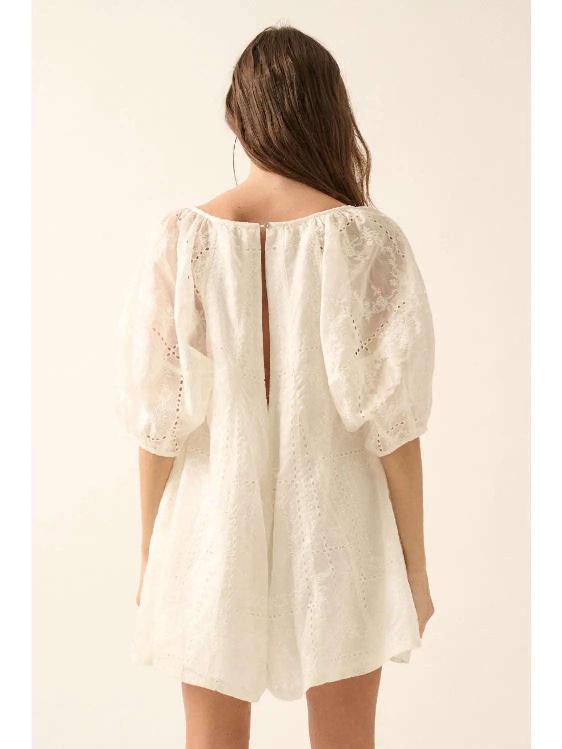 Cream So Pure Eyelet Lace Puff-Sleeve Romper Rear View Showcasing Button Closure