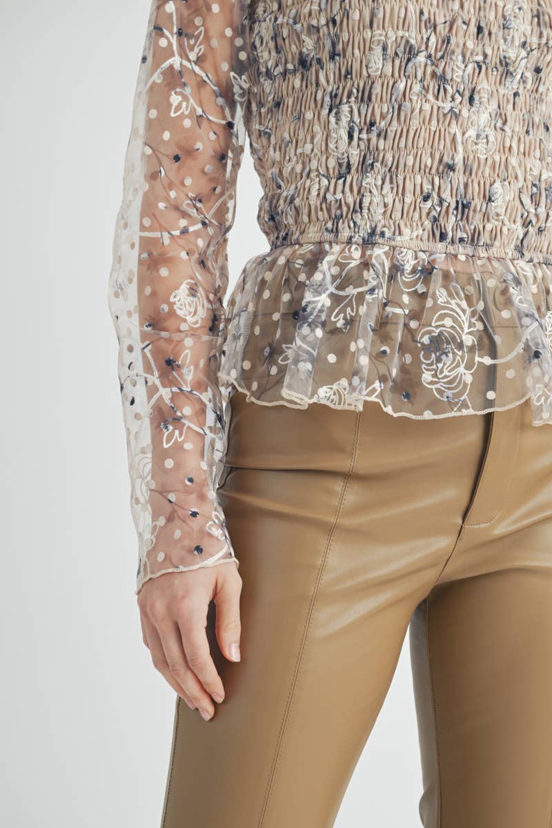 Elowen Peplum Top Close-up of floral embroidery and dotted mesh texture