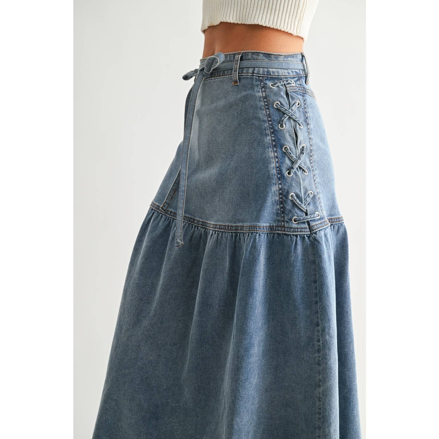 Medium Wash Denim Midi Skirt Side View showcasing lace up detail