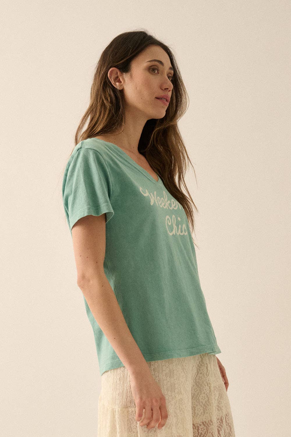 Side front view of Veyra Graphic Tee highlighting drop shoulders, relaxed silhouette and easy drape