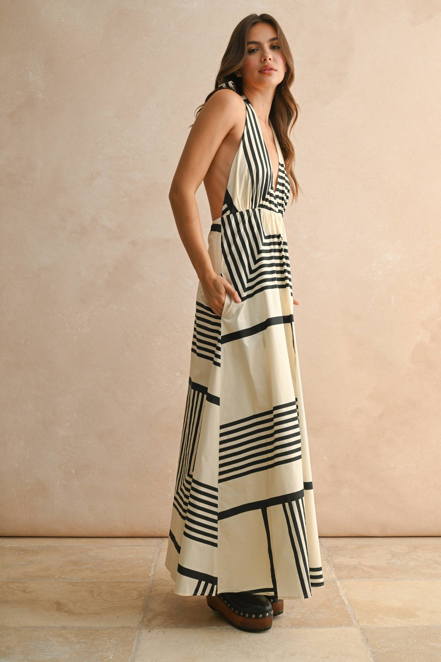 Side profile highlighting the lightweight drape and graceful movement of the fabric.