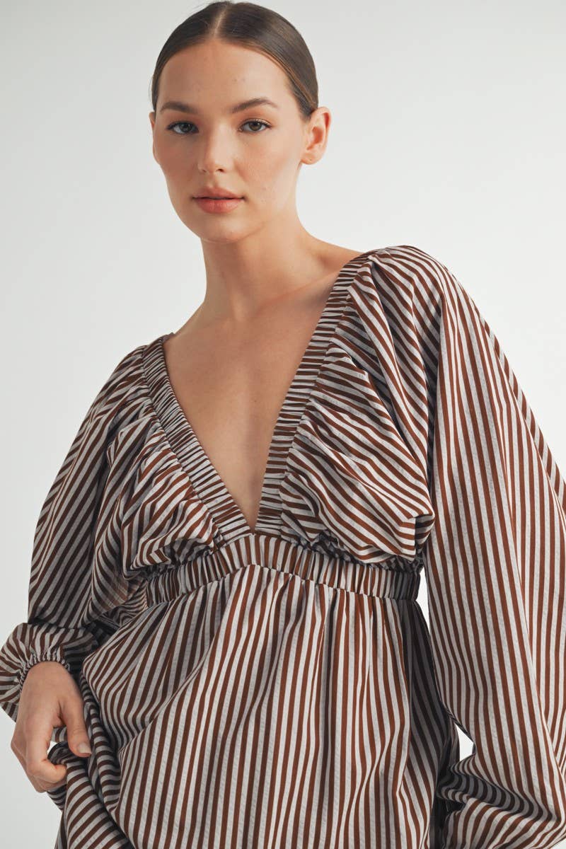 Sorrelle Maxi Dress Close-up of striped brown fabric with flowing texture