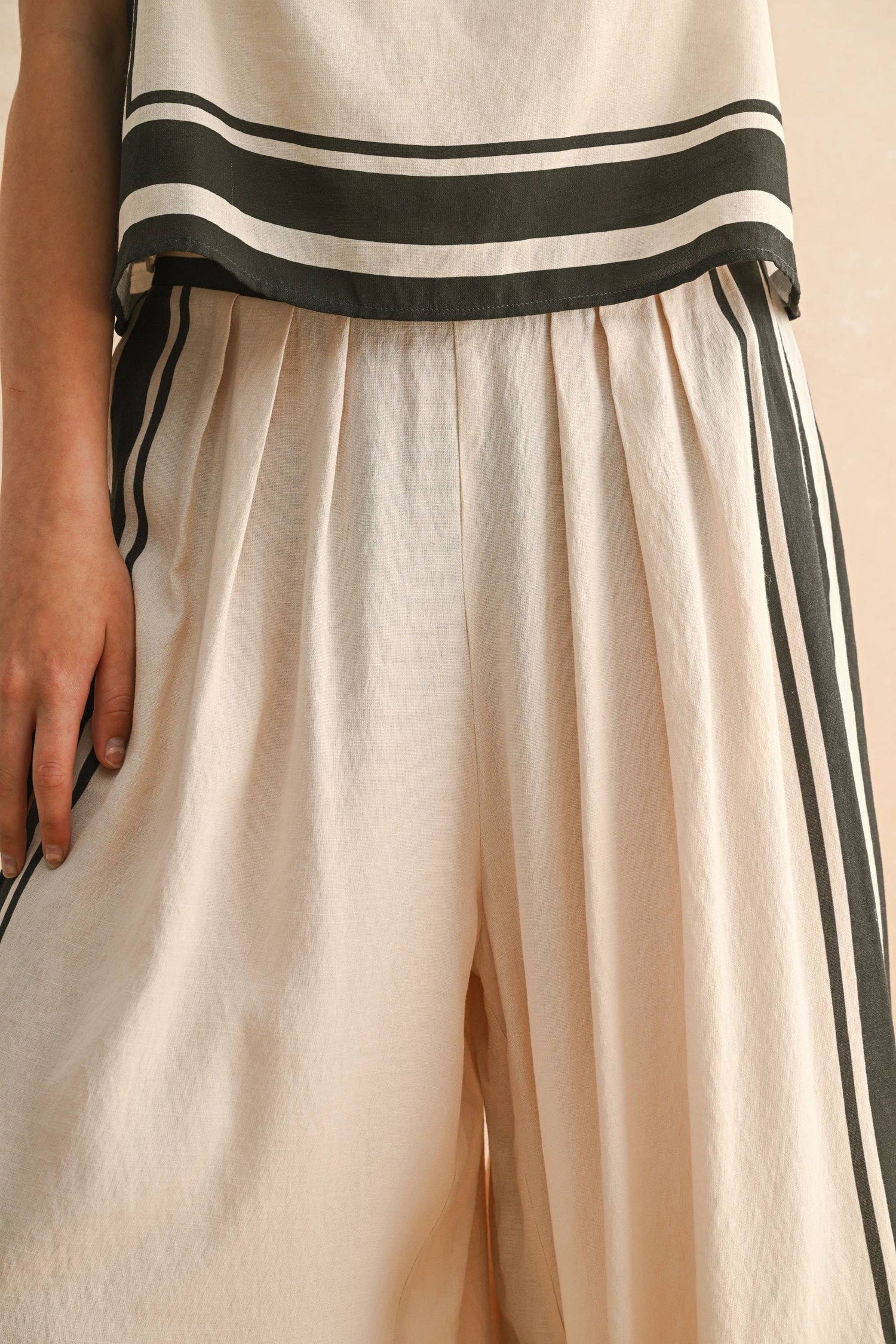 Tan/Black Border Stripe Pattern Pants worn with matching top