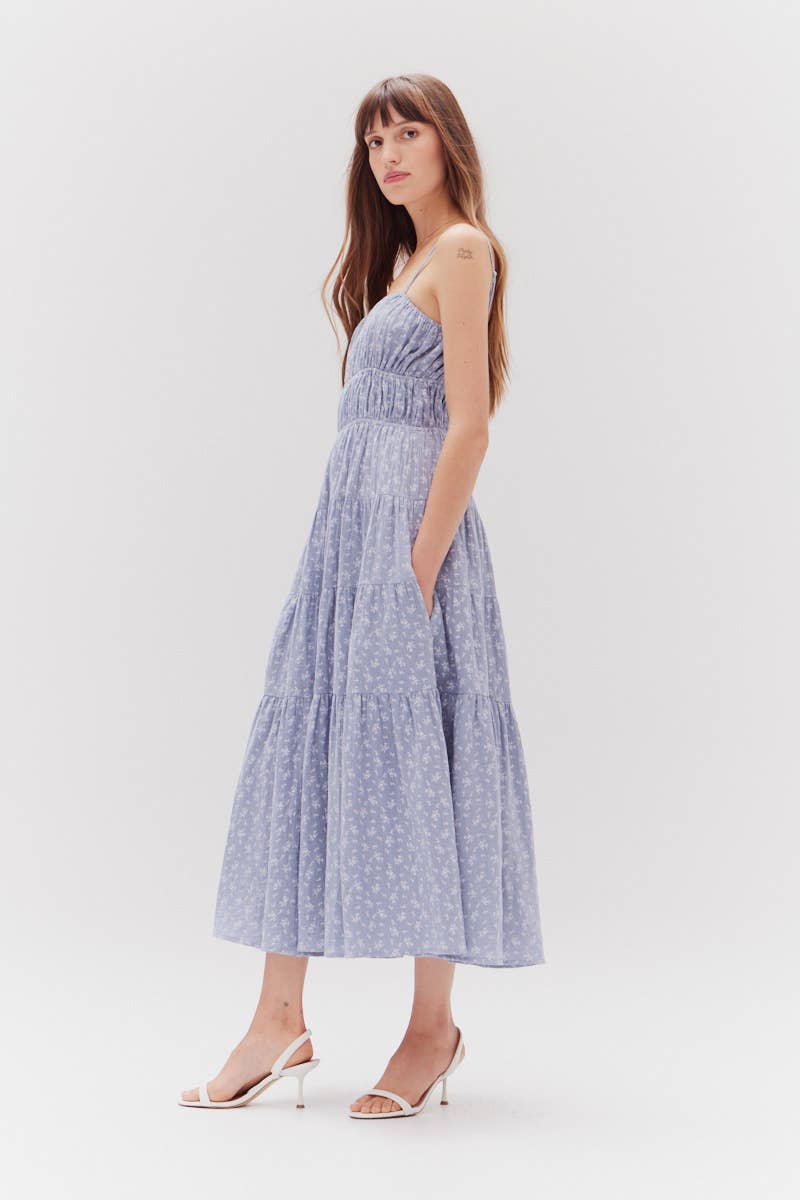 The Indigo Printed Gauze Midi Dress featuring pockets.