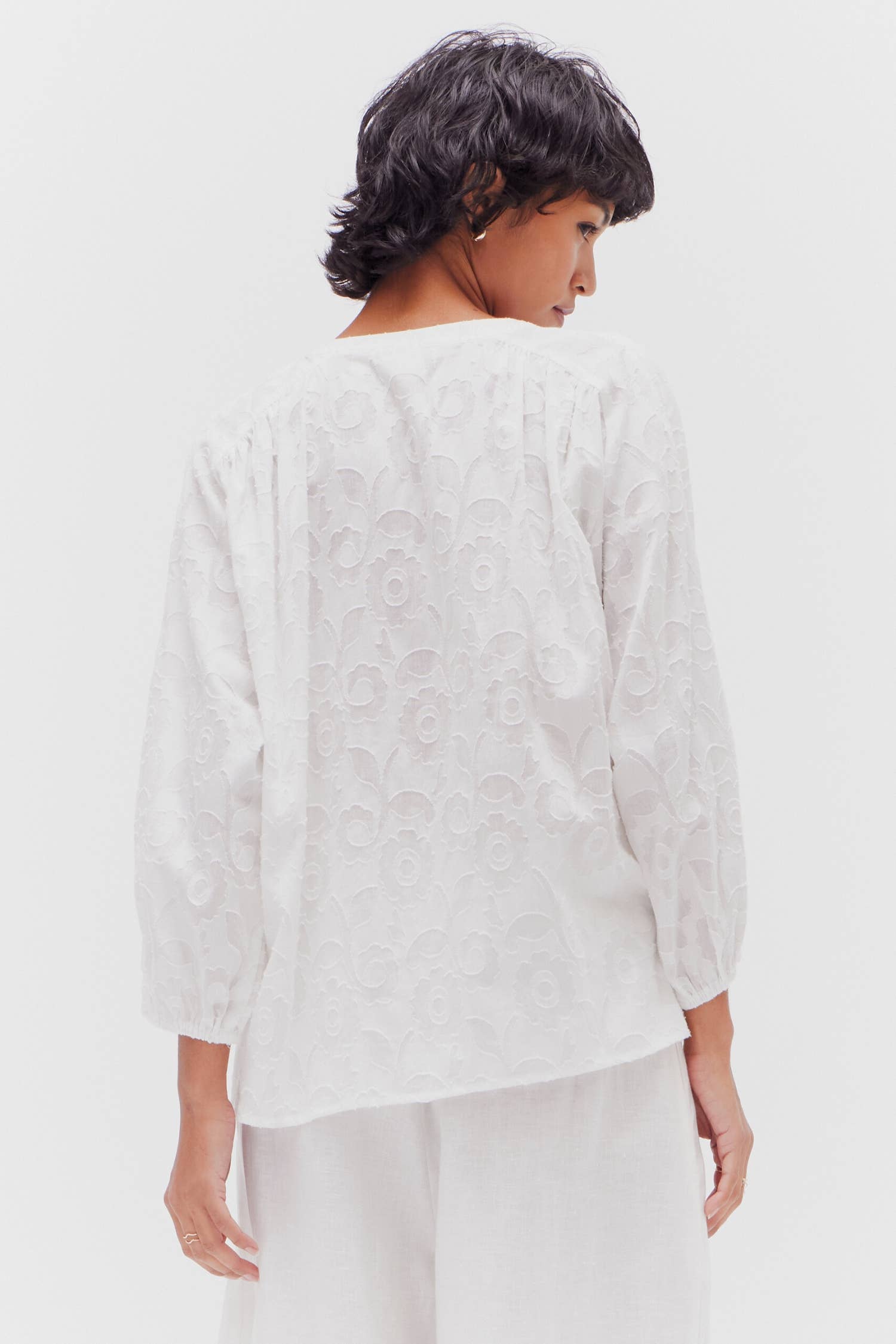 The Jacquard Floral Cotton Blouse in Off White colourway. Rear View.