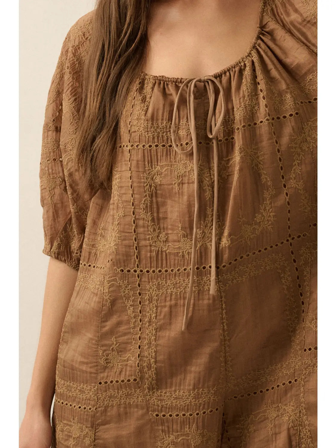 Toffee So Pure Eyelet Lace Puff-Sleeve Romper close up view of bodice